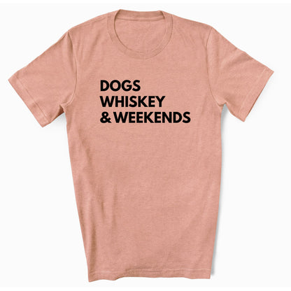 T-shirt colored prism sunset that has in black text Dogs Whiskey & Weekends