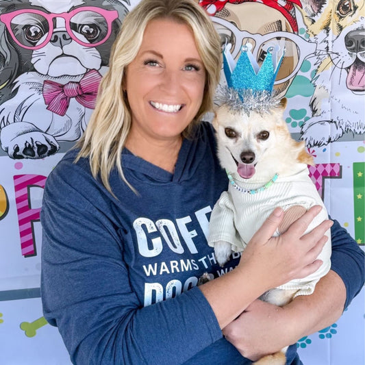 Dog mom with her rescue dog wearing a Luv the Paw t-shirt hoodie