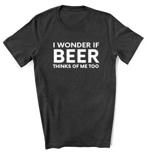 Black t-shirt with white text 'I WONDER IF BEER THINKS OF ME TOO' on a white background