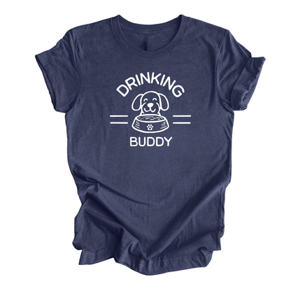 Heather Navey t-shirt featuring featuring a dog and a dog bowl with the text 'Drinking Buddy.' Perfect for dog lovers who enjoy taking their furry friends to outdoor patios and breweries.