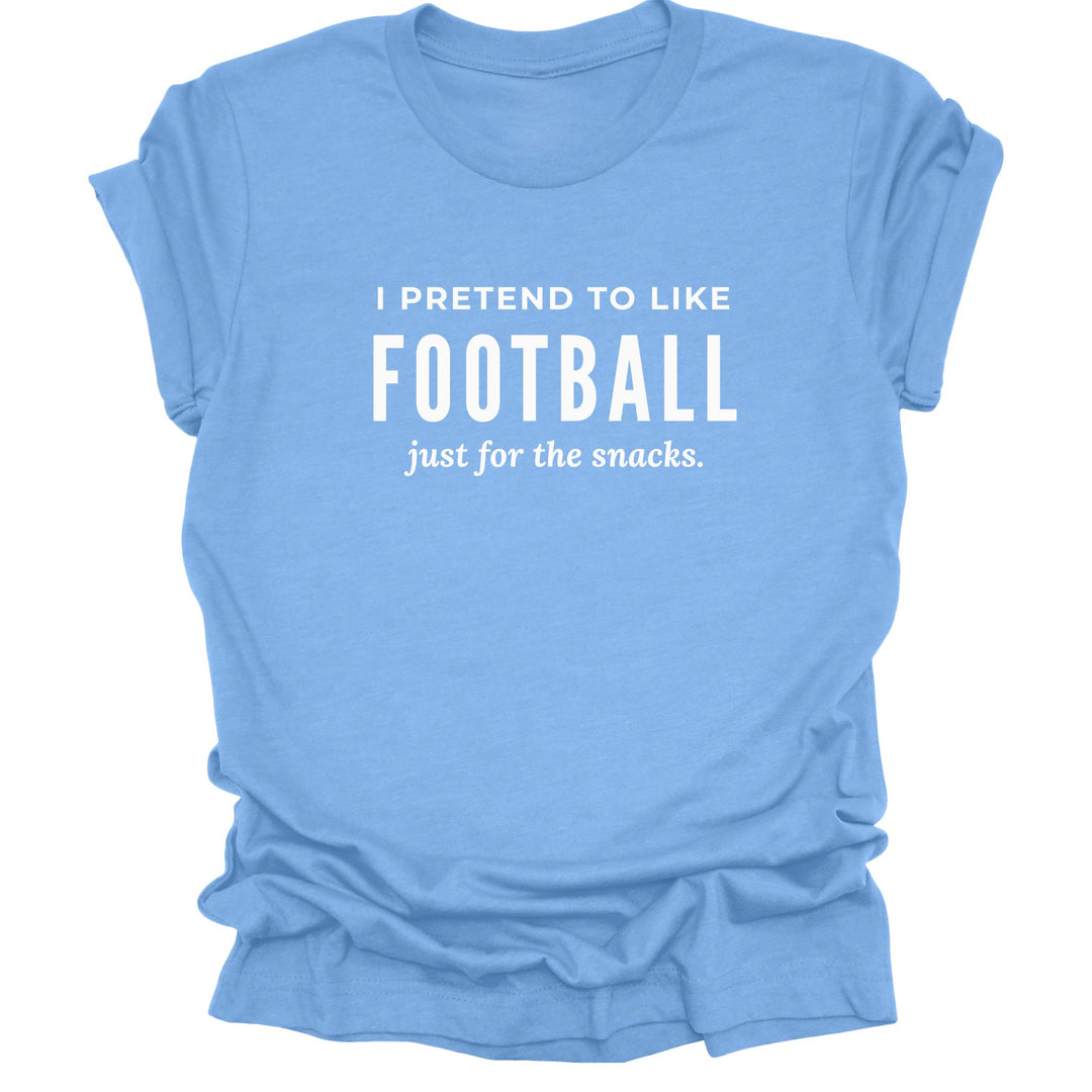 Funny football titans blue T-shirt with white lettering that reads “I Pretend to Like Football Just for the Snacks.”