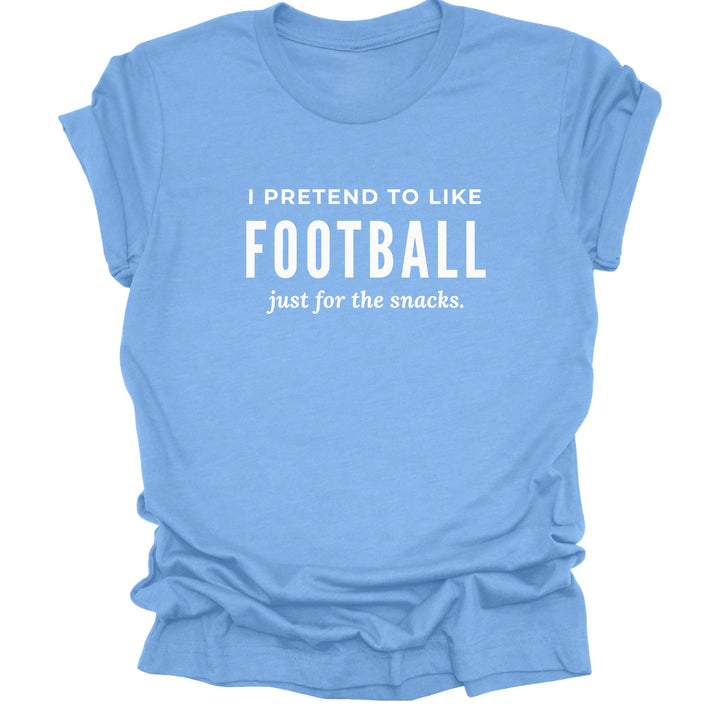 Funny football titans blue T-shirt with white lettering that reads “I Pretend to Like Football Just for the Snacks.”