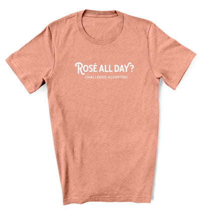 Image of a Heather Sunset unisex shirt featuring the playful phrase 'Rose All Day' in a simple font, perfect for summer fun and day drinking events. The shirt exudes a sense of fun and style for any rose wine drinkers.