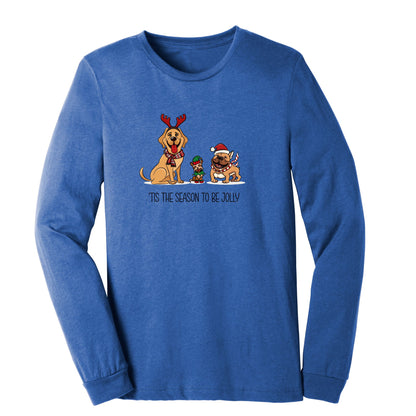 Festive long-sleeve t-shirt in heather true royal featuring three happy dogs, two in Santa hats and one in an elf hat, perfect for dog lovers and holiday celebrations.
