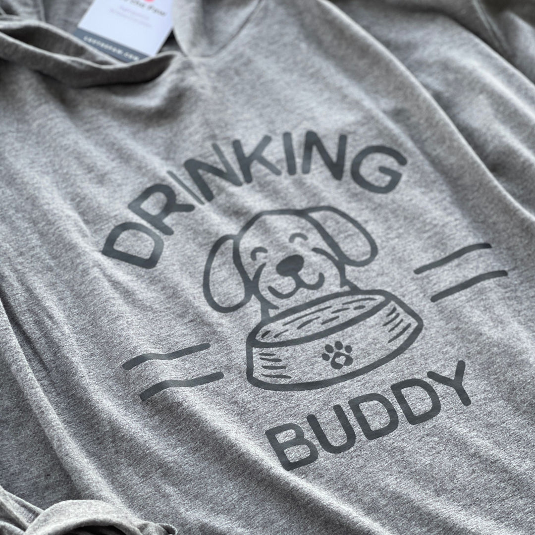 Gray t-shirt hoodie that has a dog behind a dog bowl with text 'Drinking Buddy'